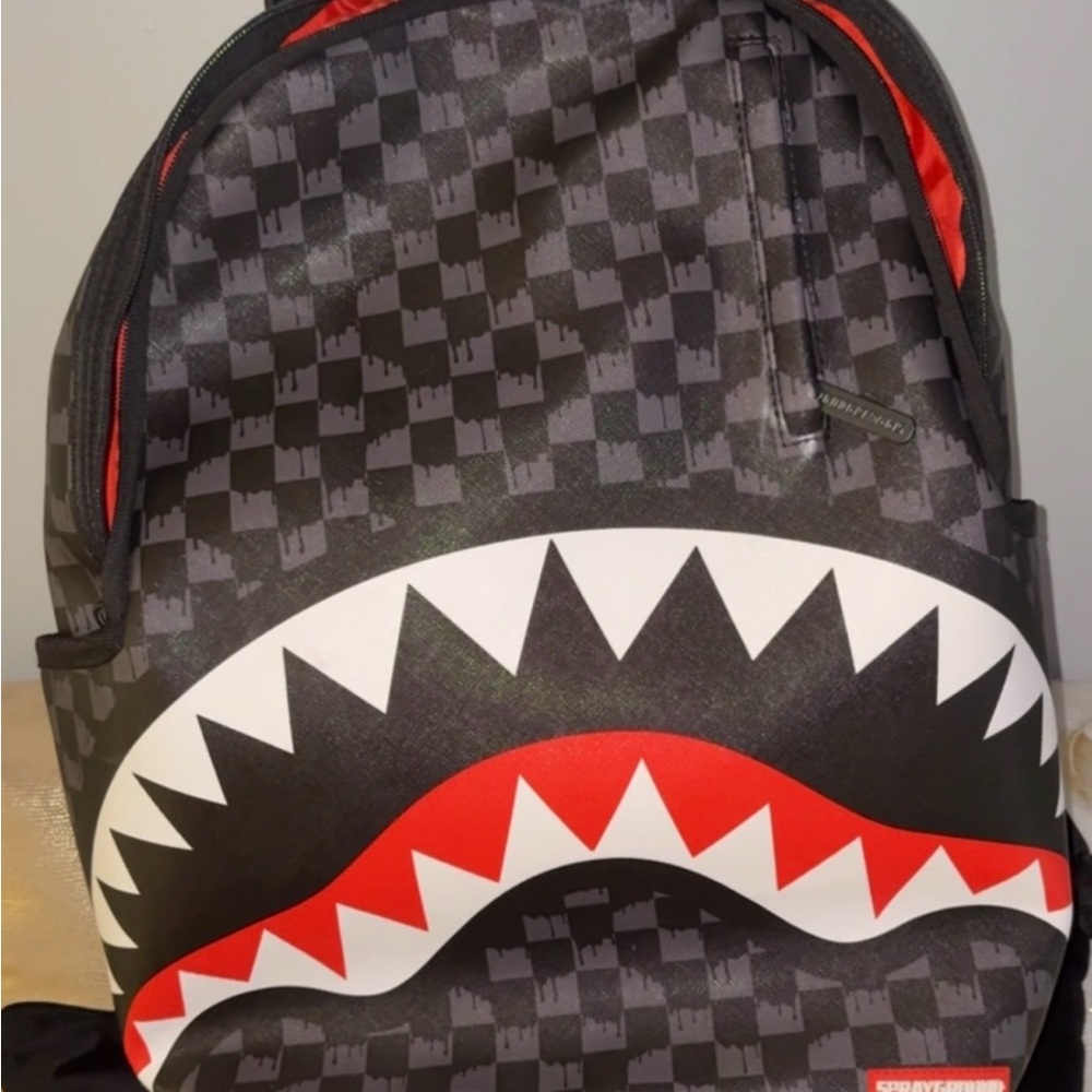 Sprayground Checkered Shark Backpack in Black and Red